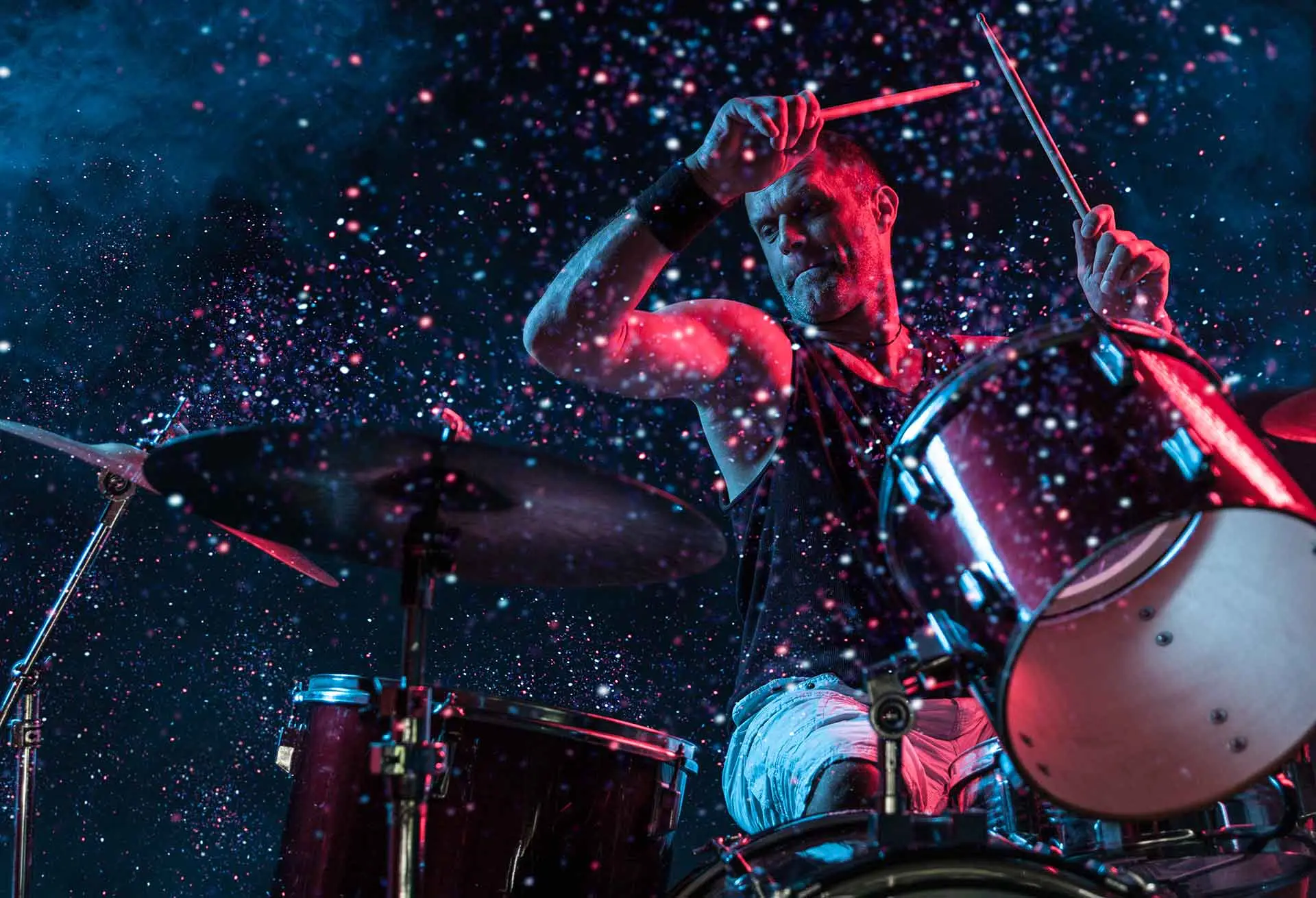 Drummer playing passionately on stage!