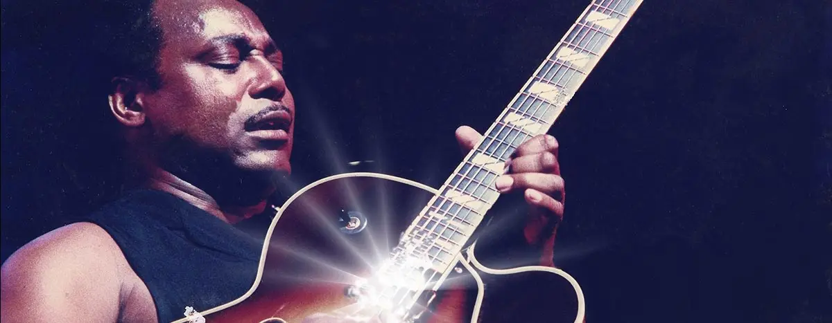 George Benson playing guitar