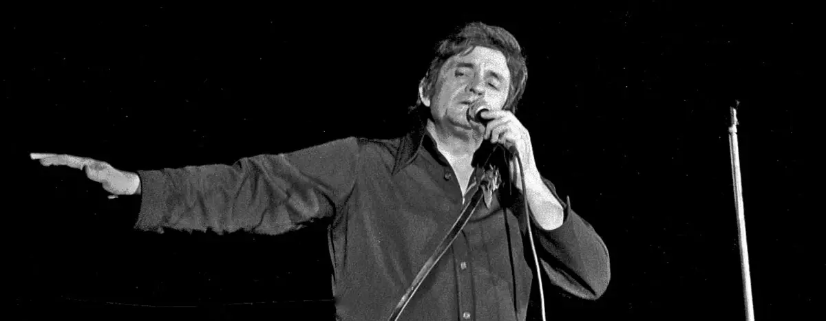 Johnny Cash performing on stage