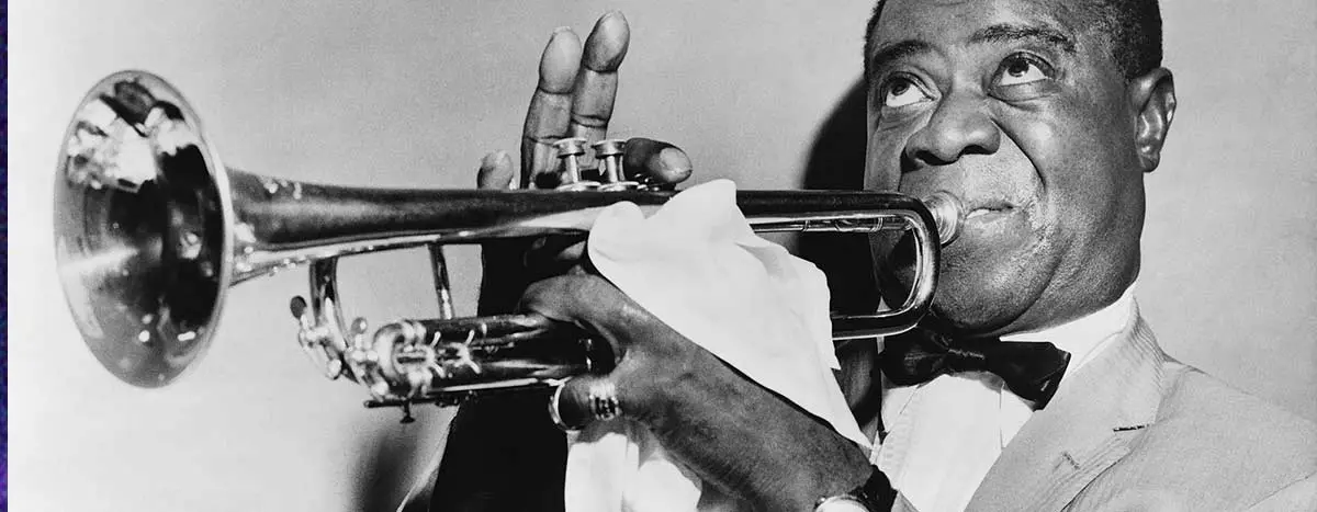 Louis Armstrong playing trumpet