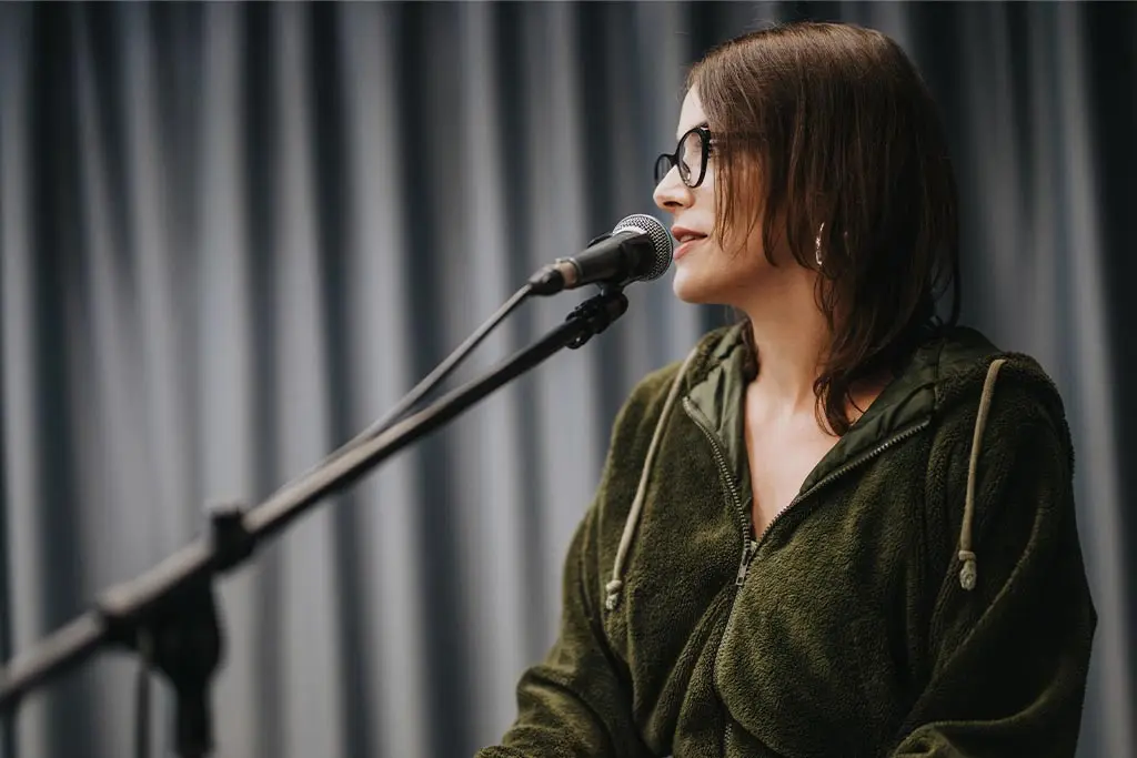 Middle aged woman singing