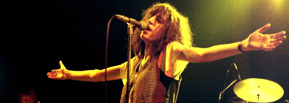 Patti Smith singing and performing on stage