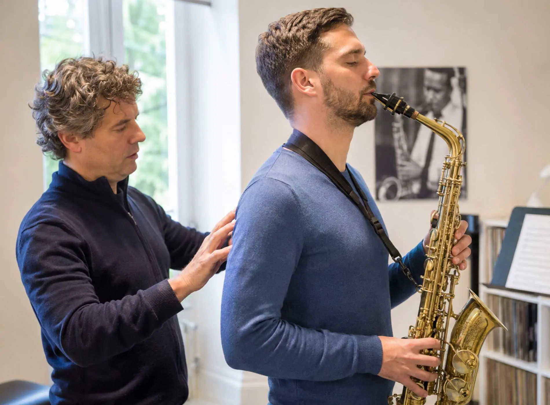 Teacher training with breath to saxophone student
