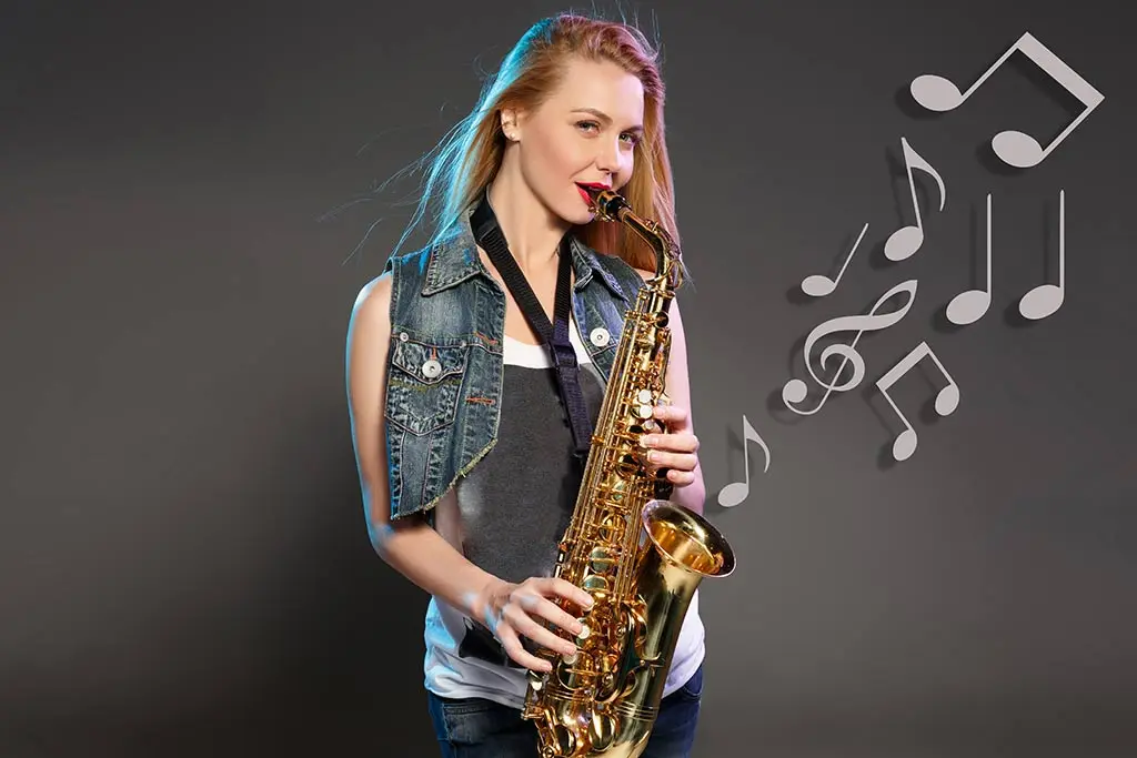 Woman playing an alto saxophone beside floating music notes