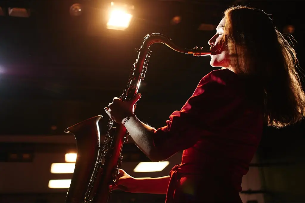 Woman playing saxophone