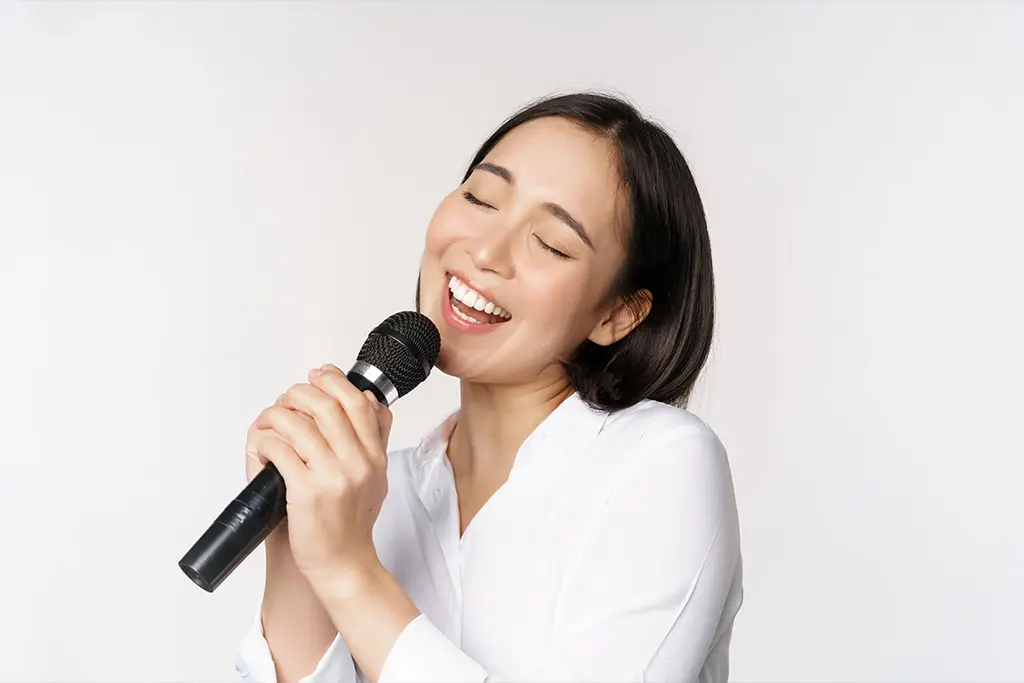 Woman singing passionately