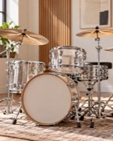 Drum kit in a sunlit modern studio