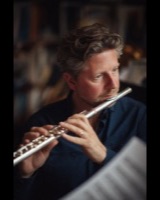 A man playing the flute