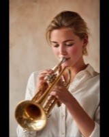 A woman playing the trumpet